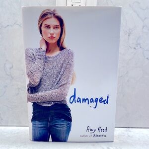 Damaged by Amy Reed Hardcover Book